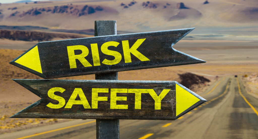 Sign reading: Risk Safety
